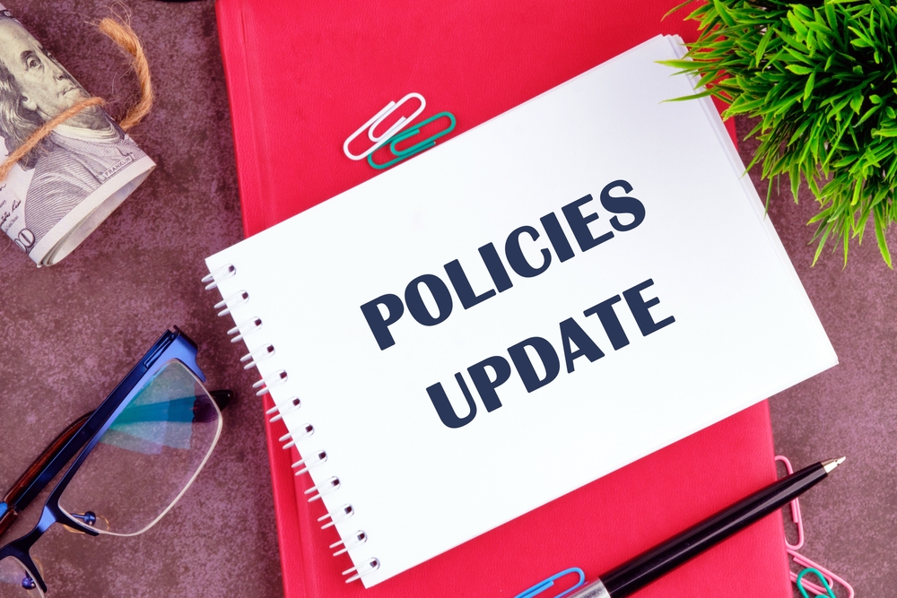 policies,update,written,in,a,notebook,on,a,blank,sheet