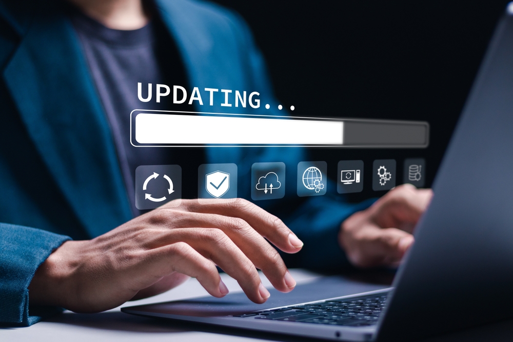 man,use,laptop,with,virtual,installing,update,bar.,software,updates